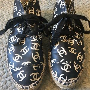 CHANEL logo lambskin leather high tops